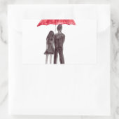 Liebe-Paar mit rotem Schirm. Rechteckiger Aufkleber (Tasche)