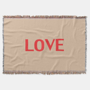 "Liebe" rote Buchstaben beigefarbener Hintergrund Decke