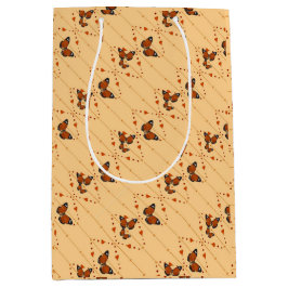 Liebe und Schmetterlinge in orangefarbener Diagona Mittlere Geschenktüte
