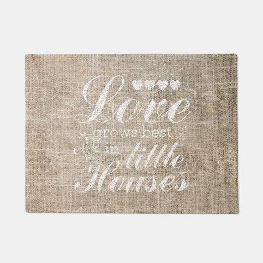 Liebe wächst in der kleinen Haus-Zitat-Tür-Matte Fußmatte (Vorderseite)