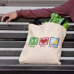 Lieben für Frieden Tragetasche<br><div class="desc">Liebe Bananen Ein niedliches Bananenliebhaber-Geschenk mit einem Schild und einem Herz neben den gelben Früchten.</div>