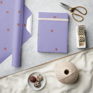 Liebenswerter lila Marienkäfer Geschenkpapier