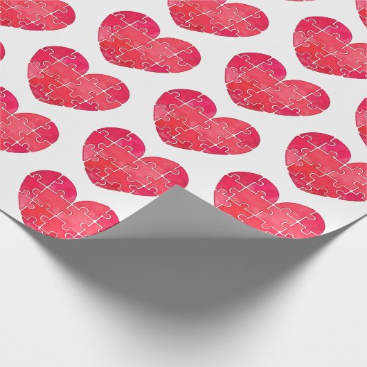 Liebespuzzle gelöst, rotes Puzzleherz Geschenkpapier (Ecke)