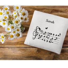 Liebesvögel, die eine Erweiterung der Familie erwa Kissen