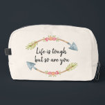 Life is Tough Watercolor Floral Arrow Cream Waschbeutel<br><div class="desc">"Life is tough, but so are you' motivational quote, framed top and bottom with beautiful watercolor tribal floral arrows, on a cream background. Perfect pick me up and positive vibes to remind you 'you are amazing' and 'you can do this', every time you reach for your Dopp Kit travel bag....</div>