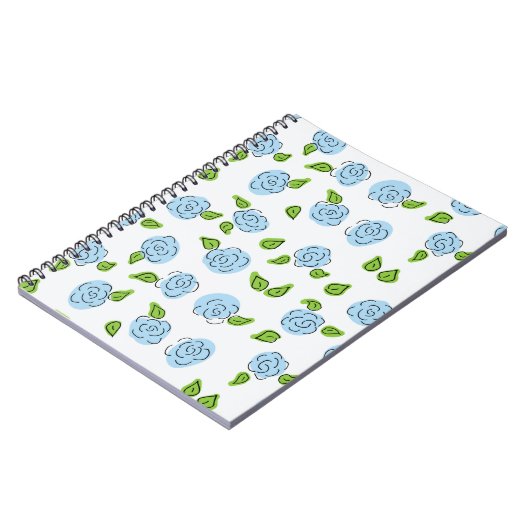 Light Blue Open Blume auf White Spiral Notebook Notizblock (Linke Seite)