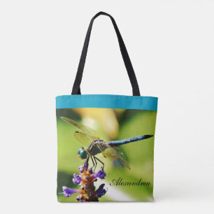 Lila Blumen der aquamarinen blauen Libelle stauen Tasche
