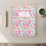 Lila Blütenfarbe Planer<br><div class="desc">Individuell gestaltetes Planerheft mit lila Blumenmuster in Aquarellfarbe mit personalisiertem Namen.</div>