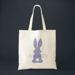 Lila Bunny Silhouette Oster Personalisiert Tragetasche<br><div class="desc">Lila Sonnige Silhouette Ostern Personalisierte Kinder Ei Jagd Tasche. Lila sonnige Silhouette mit flauschigen Schwänzen. Personalisieren Sie Ihre Kinder mit dem Namen Ihres Kindes in der Mitte. Ändern Sie die Farbe des Textes, indem Sie 'Anpassen' wählen. Niedliche personalisierte Tasche für die Ostereierjagd, Leckereien aus dem Osterhasen oder Kinder, die Hasen-Kaninchen...</div>