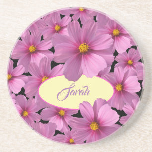 Lila Cosmos-Blume-Design auf schwarzem Hintergrund Getränkeuntersetzer