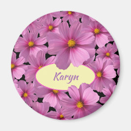 Lila Cosmos-Blume-Design auf schwarzem Hintergrund Magnet