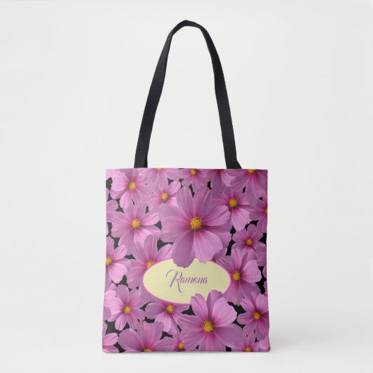 Lila Cosmos-Blume-Design auf schwarzem Hintergrund Tasche (Vorderseite)