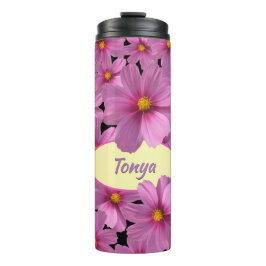 Lila Cosmos-Blume-Design auf schwarzem Hintergrund Thermosbecher