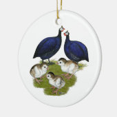 Lila Guinea-Familie Keramikornament (Links)