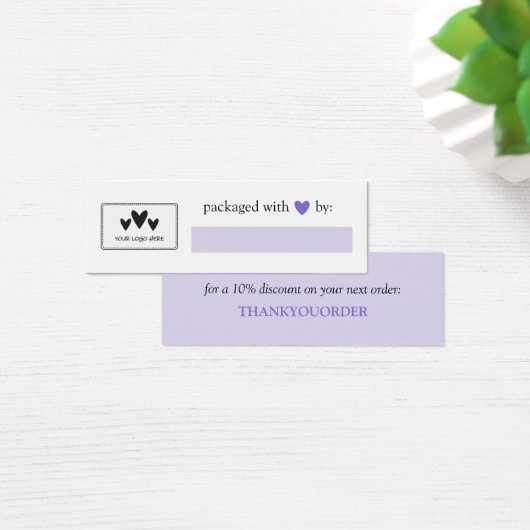 Lila Herz verpackt mit Logo für die Liebe (Schreibtisch)