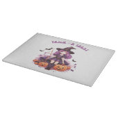 Lila Hexenkürbis und Fledermäuse tricksen oder beh Schneidebrett (Ecke)