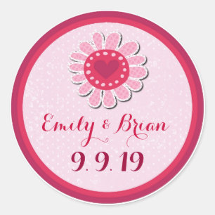 Lila Hochzeitstickeretiketten mit  Blume in rosa. Runder Aufkleber