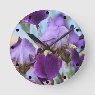 Lila Iris-Blumen Runde Wanduhr