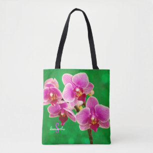 Lila Orchidee auf grüner Tragetasche Tasche