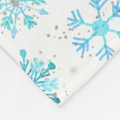 Lila und blaue Winterschneeflocken Fleecedecke (Ecke)