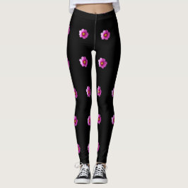 Lila und gelbe Kosmos-Blume auf schwarzen Leggings