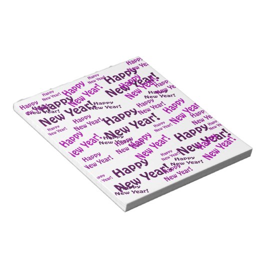 lila und glücklicher Neujahrstext Notizblock (angewinkelt)