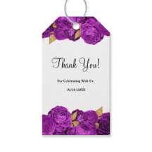 Lila und goldene blumengeschenkte Tags