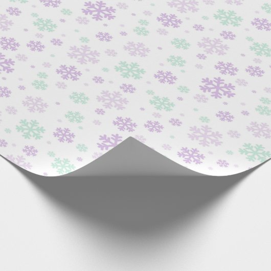 Lila und grüne Weihnachtsschneeflocken Geschenkpapier (Ecke)