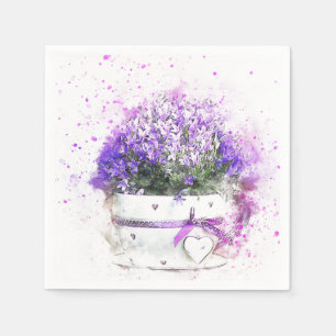 Lila und Lavendel-Blumen im rosa und weißen Topf Serviette