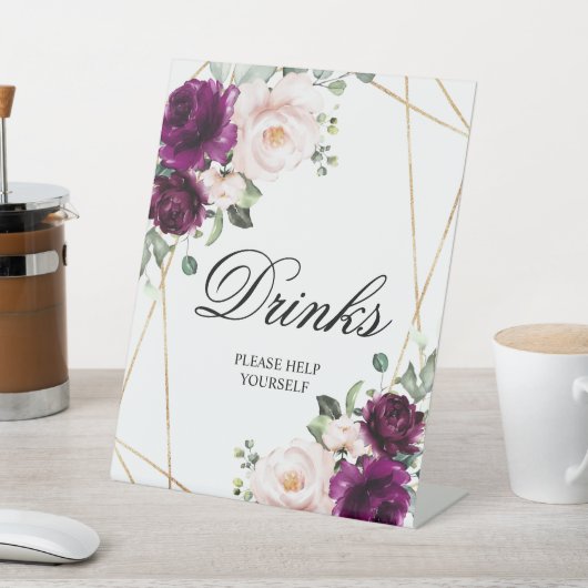 Lila und rosafarbene Duschtränke Unterschrift Sockelschild (In SItu)