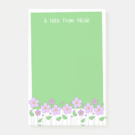 Lilac-Blume und Grüne Post-It-Notes Post-it Klebezettel