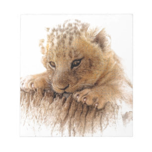 Lion cub nahe niedliche Augen aussehen Notizblock