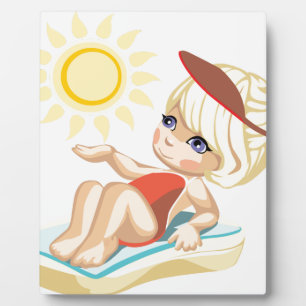 Little girl sunbathing on the beach fotoplatte