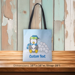 Little penguin sitting with snowballs tote bag tasche
