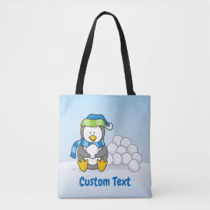 Little penguin sitting with snowballs tote bag tasche