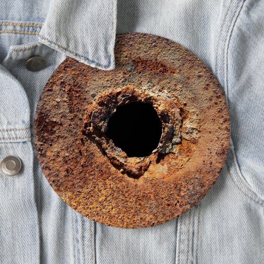 Loch im Rost Button (Beispiel)