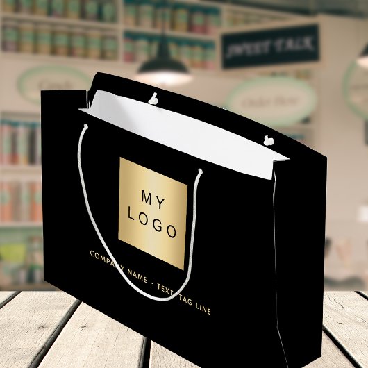 Logo für das Goldgeschäft Große Geschenktüte