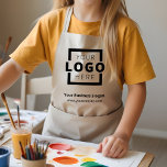 Logo-Werbeaktion für kundenspezifische Unternehmen Kinderschürze<br><div class="desc">Personalisieren Sie diese individuelle Schürze einfach mit Ihrem Firmenlogo. Die mit Ihrem Firmenlogo markierten Werbe-Schürze können für Mitarbeiter,  Wartungspersonal,  Workshops oder Werbegeschenke für Kunden eine einheitliche Markenbezeichnung sein. Diese Schürze mit Tasche ist ideal für Kinder. In anderen Farben erhältlich. Keine Mindestbestellmenge.</div>