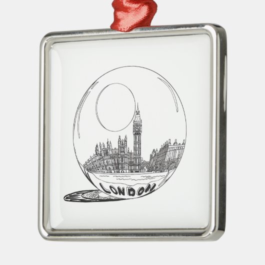 London in einer Glaskugel. Silbernes Ornament (Links)