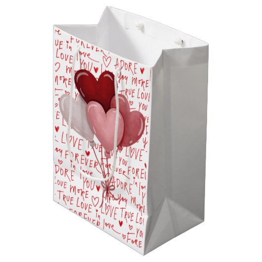 Love Vibes Medium Gift Bag Mittlere Geschenktüte (Vorderseite Schrägansicht)