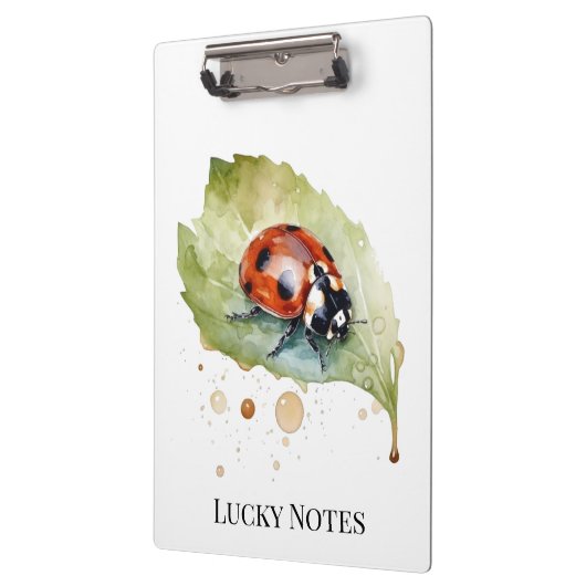 Lucky Ladybug über Leaf Klemmbrett (Links)