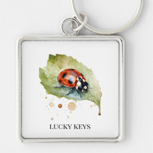 Lucky Ladybug über Leaf Schlüsselanhänger