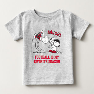 Lucy Pulls Fußball von Charlie Brown Baby T-shirt