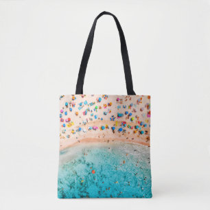 Luftblick auf den Sandstrand mit bunten Regenschir Tasche