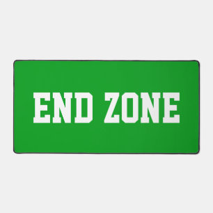Lustig sportliches weißes END ZONE-Text auf hellgr Schreibtischunterlage