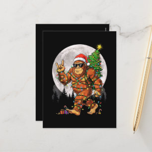 Lustige Bigfoot-Weihnachtslichter und Mond Feiertagspostkarte