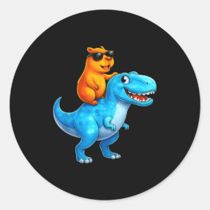 Lustige Capybara auf Dinosaurier reitend, Dino rei Runder Aufkleber