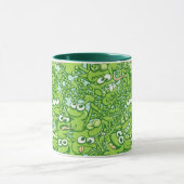 Lustige grüne Frösche verwickelt in einem Tasse (Zentrum)
