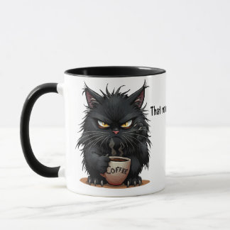 Lustige Katze, die eine Kaffeetasse hält