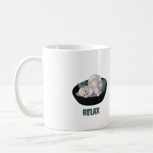 lustige Katze entspannt sich Kaffeetasse